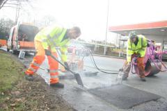 Pothole-busters in action