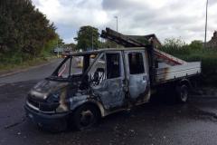 Investigation launched after van filled with gas canisters is destroyed by fire
