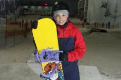 Teen snowboarder comes back in style