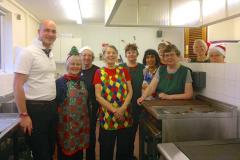 Volunteers cook up festive treat for the elderly