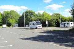 Travellers return to set up illegal encampment in town centre car park