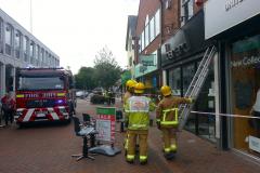 Fire crews called to dangerous shop sign