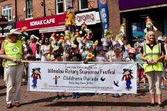 Children join the colourful scarecrow parade