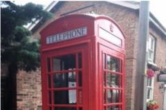 Town Council refurbishes telephone box