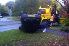 Car overturns at Alderley Road roundabout