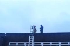 Three youths rescued from roof on Grove Street