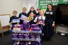 Primary school pupils collect donations for disadvantaged children