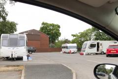 Travellers set up illegal encampment in supermarket car park