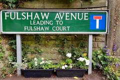 Volunteers spruce up Wilmslow street signs