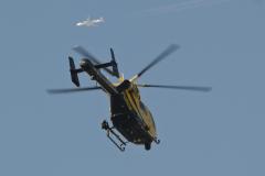 Armed police and helicopter join police search