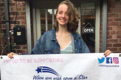 Ellie goes a cut above to raise £1000 for children with cancer