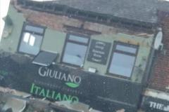 Restaurant roof collapses onto outdoor seating area