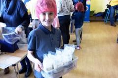 Volunteers pack a mega 20,000 meals