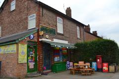 Staff left shaken as armed robber steals £2000