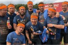 Friends get muddy in memory of Clean Team founding member