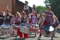 Scarecrows dance to the samba beat