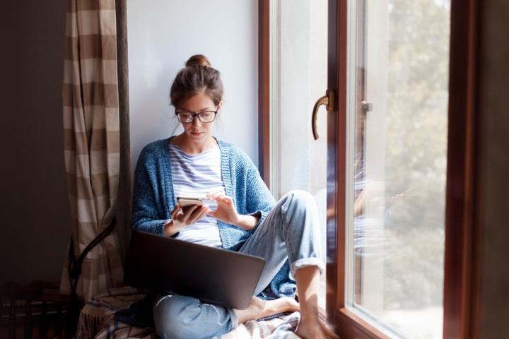 Woman self-isolating at home