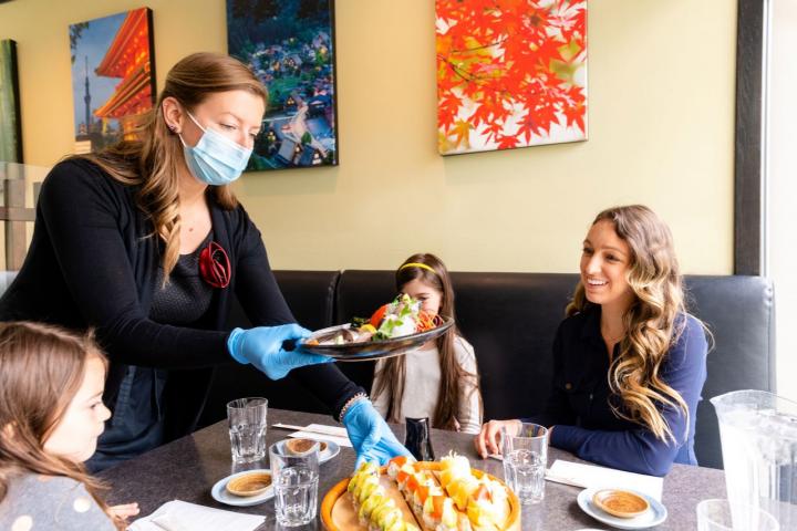 Family dining indoors Getty image